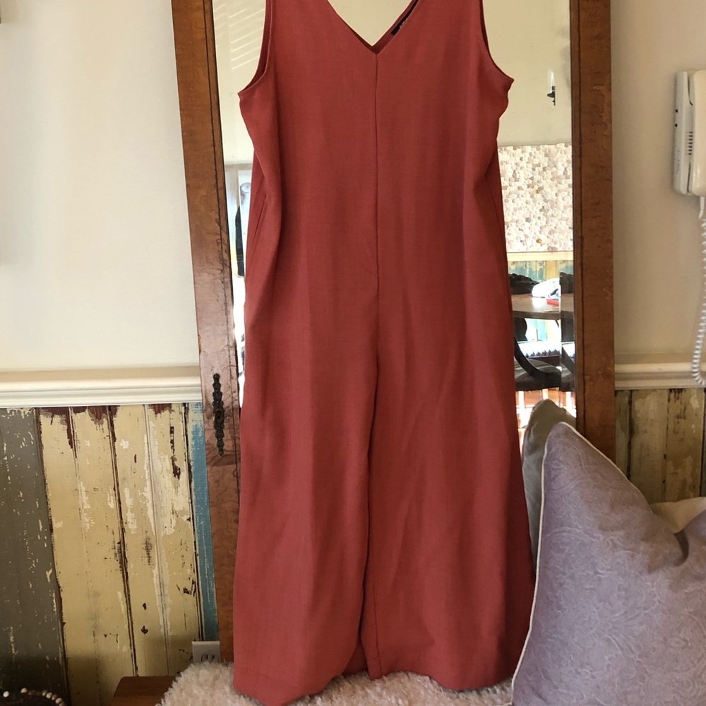 Wideleg romper w shoulder ties vneck & pockets